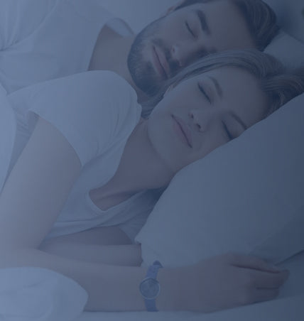 Couple sleeping in bed